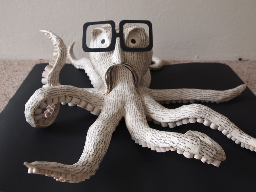 I-cut-old-books-into-hundreds-of-strips-scales-and-curls-and-turn-them-into-animal-sculptures-570cb35939952__880